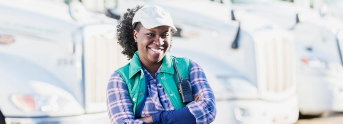 Female truck driver smiling